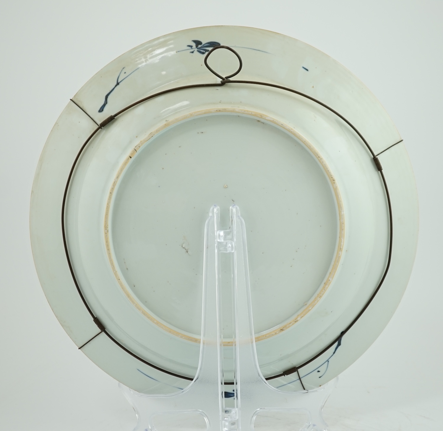 A Chinese blue and white 'scroll and blossom' charger, Qianlong period